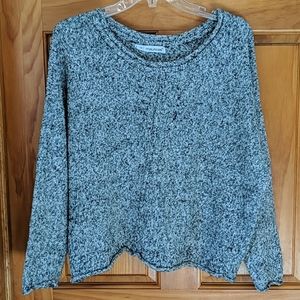 Maurice's gray and black sweater